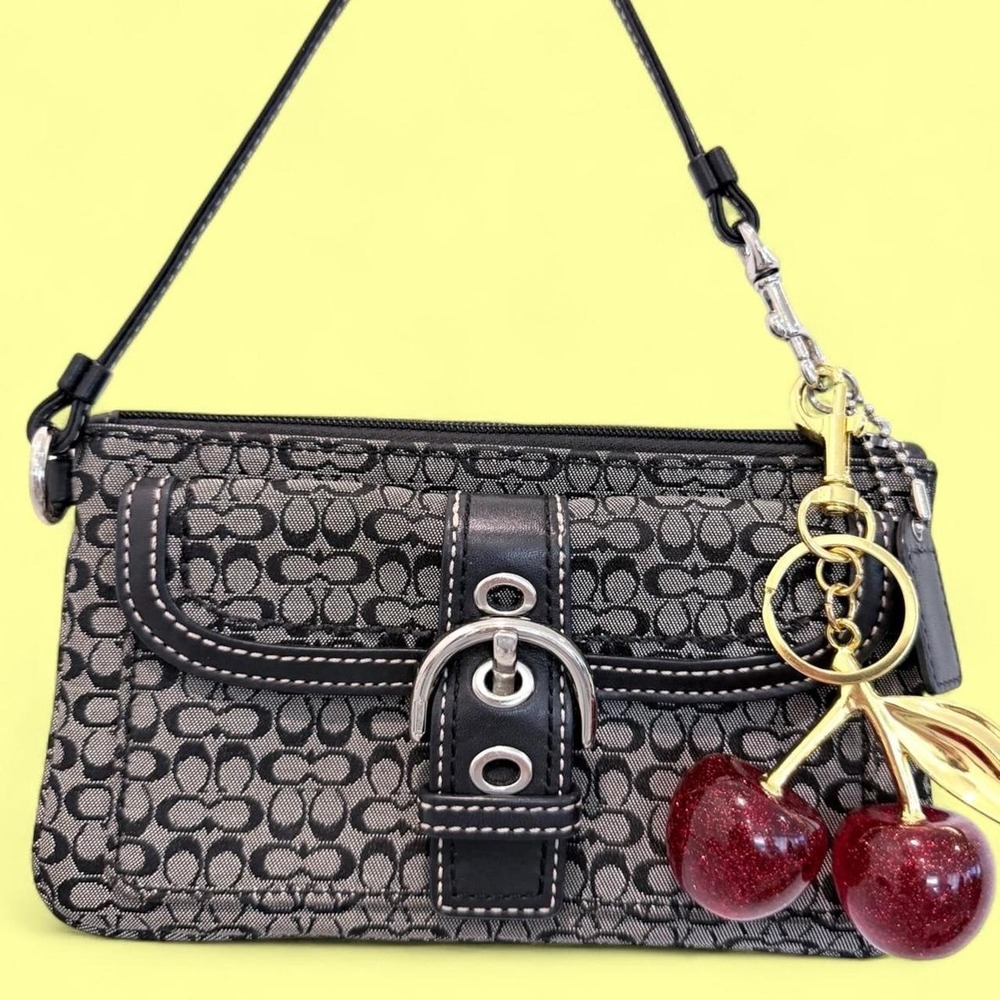 vintage Coach wristlet featuring the classic Signature "C" wallet wristlet